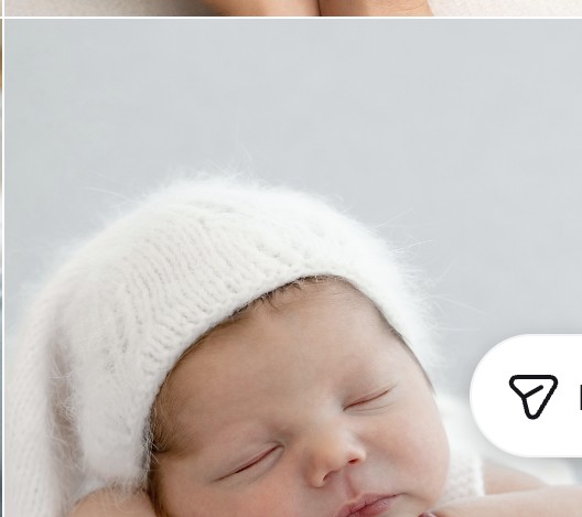 Newborn wearing a cream knit hat